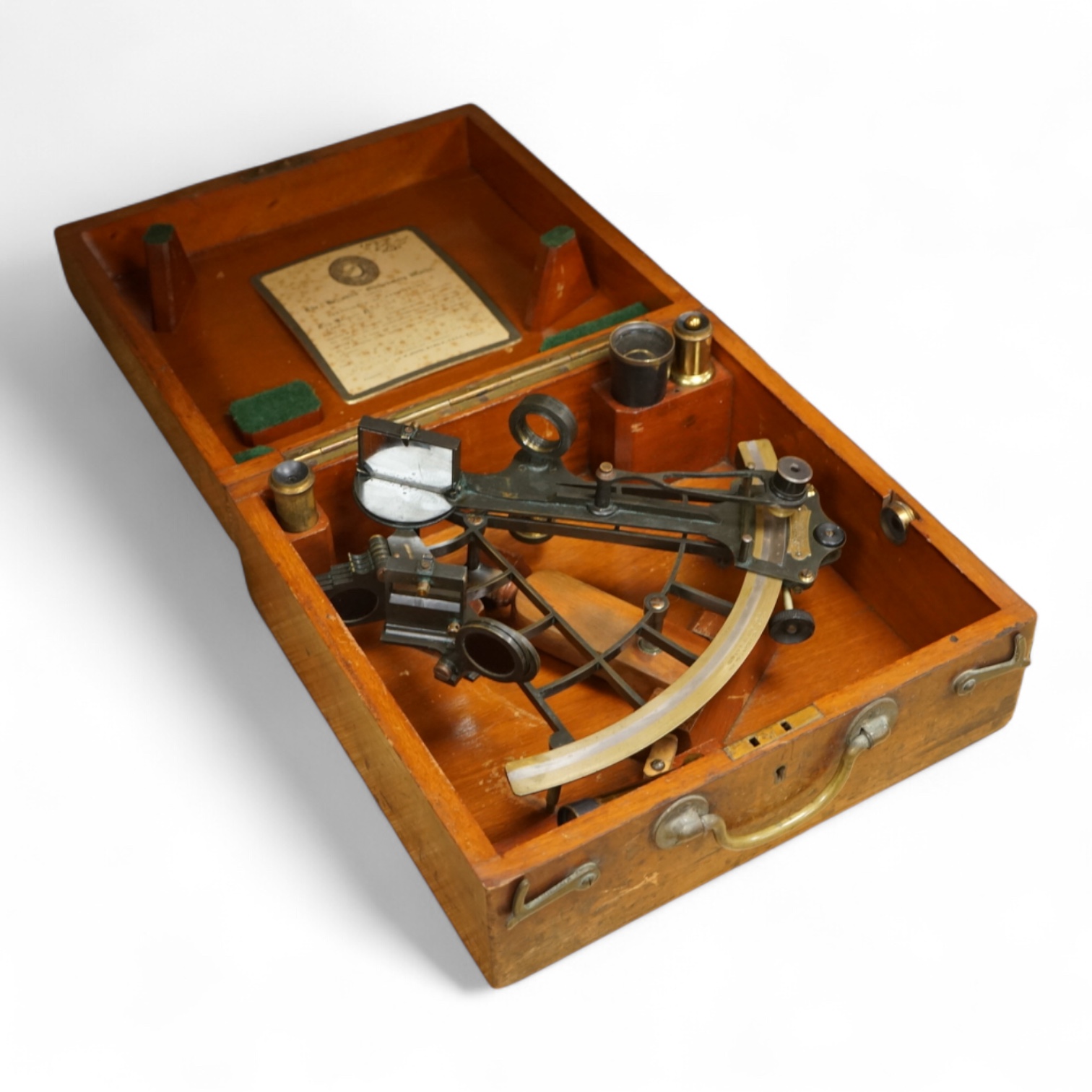 A 19th century mahogany cased sextant by Heath & co Ltd., New Eltham, London, in a fitted case with card label for the Hezzanith Observatory Works